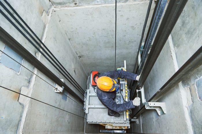 To prevent being pinned between equipment workers should avoid